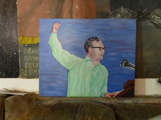 A portrait of Allende giving a speech