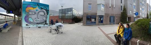 The first, small mural on the platform taking shape